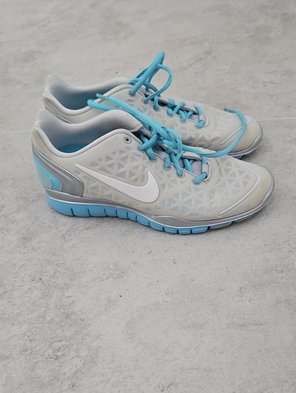 Nike Women’s Light Gray and Aqua Performance Trainers